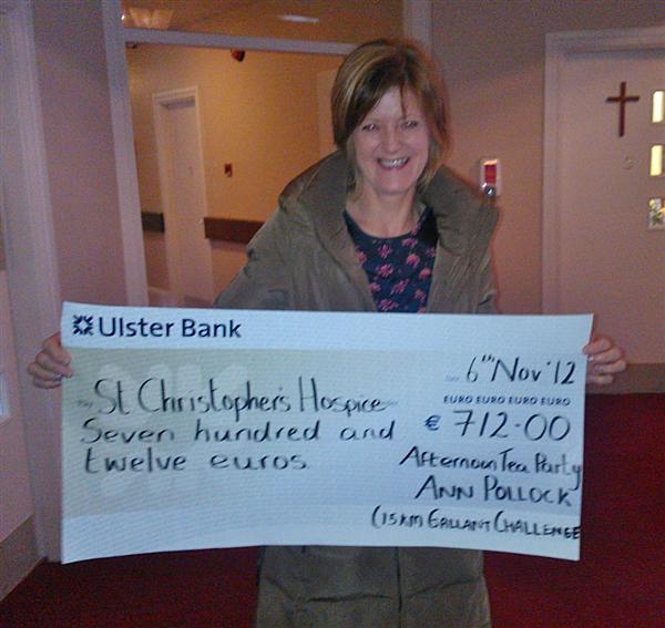Ann Pollock with cheque for St Christopher's