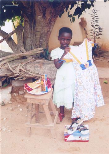 Edoh Clence with her birthday presents